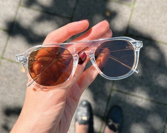 Klassiche Sonnenbrille mit Runden Gläsern | Vintage Retro Sunglasses | Sonnenbrille für Männer und Frauen | Transparent mit braunen Gläsern