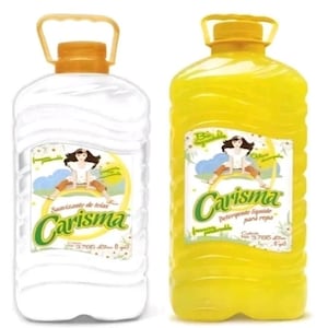 May include: Two large plastic bottles of laundry detergent. One is white, the other is yellow. Both have a yellow handle and cap. Each bottle has a label with the word "Carisma" in green and a cartoon image of a woman.