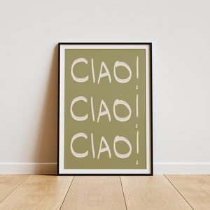 May include: A framed print with a green background and the word "CIAO!" repeated three times in white text.