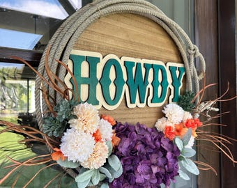 Howdy 18” round western themed door hanger with rope
