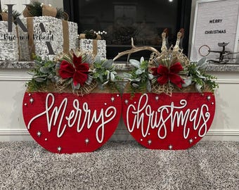 Merry Christmas 18” door signs for those that have double front doors. One sign says Merry. One sign says Christmas.