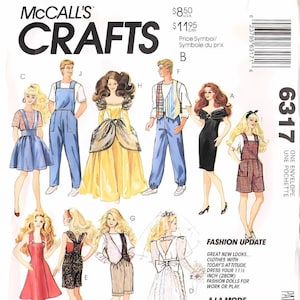May include: McCall's Crafts pattern envelope featuring illustrations of fashion doll clothing designs. The cover includes drawings of various outfits, including dresses, overalls, and a wedding gown. The text on the cover reads "Fashion Update" and "A la Mode Actuelle."