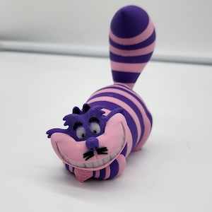 Cheshire Cat Figurine: Glow in the Dark Eyes & Mouth
