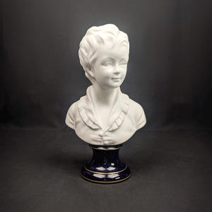 Child bust of Alexandre Brongniart, Limoges porcelain, signed Camille Tharaud after Jean Houdon