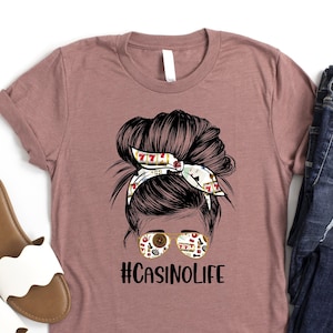a women's t - shirt with a picture of a woman's head
