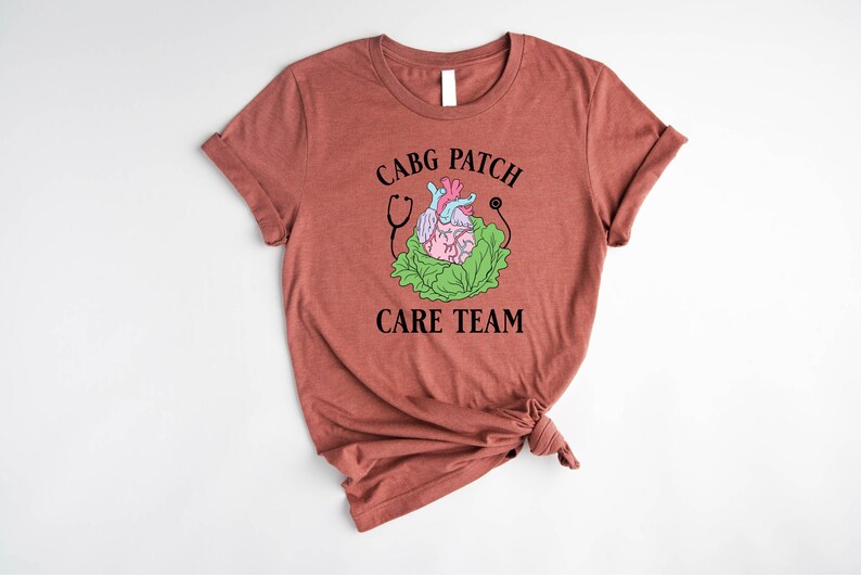 a women's t - shirt that says care team