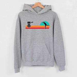 a gray sweatshirt with a picture of a giraffe on it