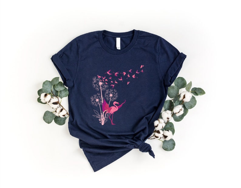 a t - shirt with a pink flamingo on it