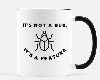 It's Not a Bug, it's a Feature Mug 11 oz. (Black + White)