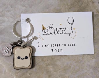 70th Birthday Gift | A Tiny Toast Keychain bag tag | Funny Milestone Birthday Keepsake | Gift for Friend