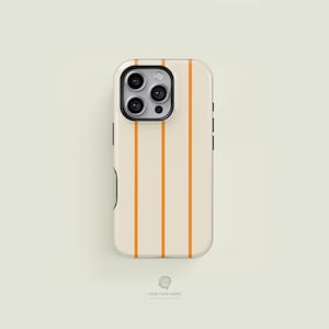 May include: A phone case with a cream-colored background and vertical orange stripes. The case has a camera cutout and black side buttons. The bottom of the case has the text "CASE FACE CASES".
