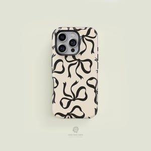 Classic Bows Black & Cream iPhone 17 / 16 / 15 / 14 / 13 Pro Max Phone Case | MagSafe Tough Protection