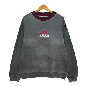 Sudadera Adidas Equipment vintage de los años 90 con cuello redondo, fabricada en Australia. Sudadera holgada gris con el logotipo bordado de Adidas Equipment, talla L.