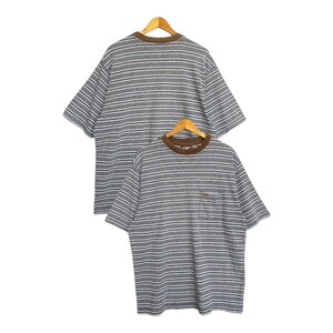 May include: A rustic wooden sign with the text "Welcome to our home" in a handwritten style. The sign features a distressed finish and a simple, inviting design, perfect for a front porch or entryway.