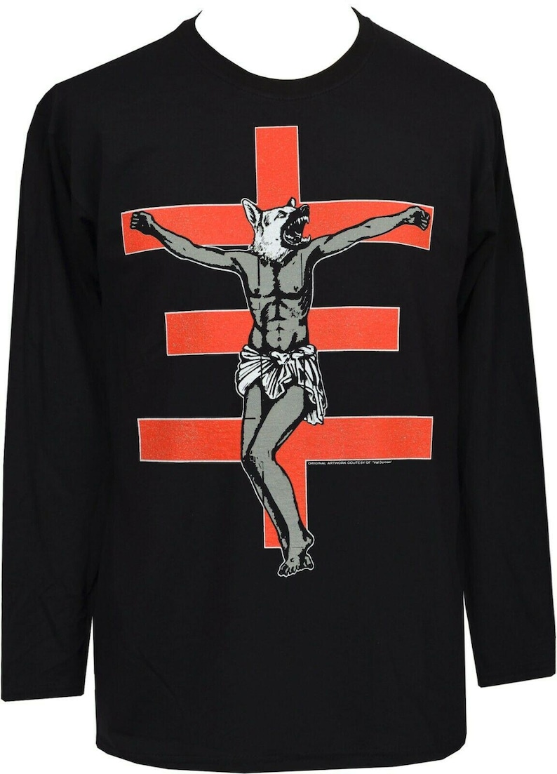 Men’s long sleeve t-shirt with bold red cross and crucified dog-headed figure artwork by Val Denham – dark, punk, and unapologetically strange.
