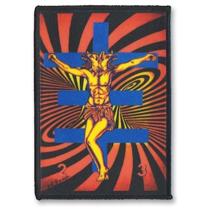 May include: A black and red swirl pattern background with a blue cross. A yellow figure with two heads is on the cross. The figure has a muscular torso and is wearing a yellow loincloth. The text "2" and "3" are visible in the bottom corners.