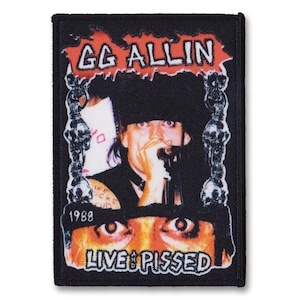 May include: Black rectangular patch featuring a portrait of GG Allin, with the text "GG ALLIN" in red above the image. The words "LIVE & PISSED" are below the image, with the year "1988" visible.