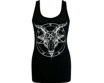 May include: Black tank top featuring a white graphic of a goat's head within a pentagram and a circle. The sleeveless top has a scoop neck and a fitted silhouette. The design is centered on the front of the garment.