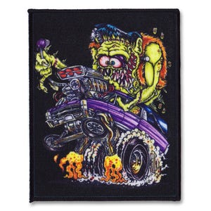 May include: A black and purple hot rod with a green monster character driving. The monster has a large mouth with sharp teeth and is holding a lollipop. The car is on fire and has flames coming out of the back.