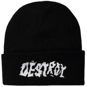 May include: Black beanie hat with the word "DESTROY" embroidered in white, stylized lettering across the front. The hat is a classic, close-fitting style, suitable for cold weather.