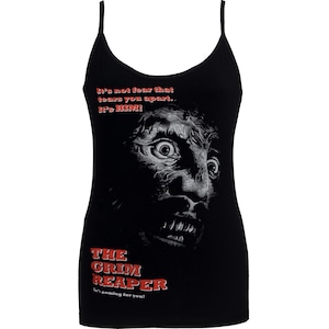 May include: Black vest top with a scary face graphic and the text "It's not fear that tears you apart. It's HIM!" and "THE GRIM REAPER is coming for you!". The graphic is in black and white, with the text in red.