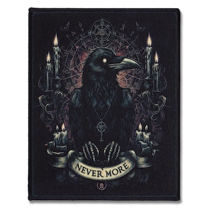 May include: A black raven with glowing eyes sits in the centre of a black and gold design with candles and the words "Never More".