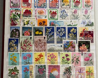 Flowers on postage stamps, nice assortment, mostly used but some mint condition. Great for collections, and any crafts if one so wish. N02