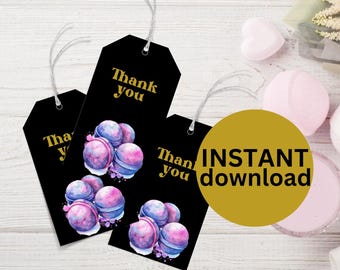 May include: Three black gift tags with gold text that says "Thank you". Each tag features a watercolor illustration of purple and pink bath bombs.