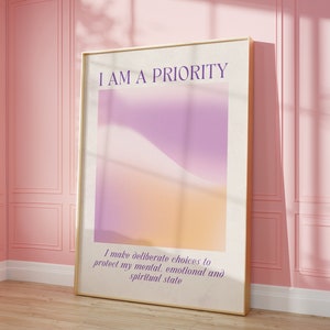 May include: A motivational poster with a gradient background of purple, pink, and orange. The text on the poster reads "I AM A PRIORITY. I make deliberate choices to protect my mental, emotional and spiritual state."