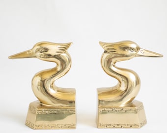 vintage brass crane bookends mid century heron bird decor solid brass holders art deco coastal shelf accents Hollywood regency style