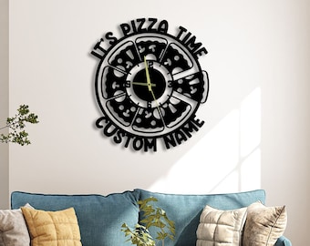 May include: Black and white wall clock with a pizza design. The clock face says "It's Pizza Time" and "Custom Name".