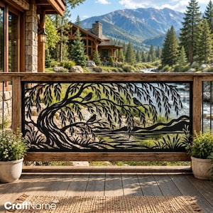 May include: A black metal railing panel featuring a laser-cut design of a willow tree with drooping branches and three birds perched on the limbs. The artwork depicts a landscape scene with a river, distant mountains, and tall grass at the base.