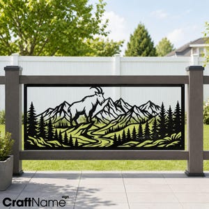 May include: A rectangular black metal fence panel featuring a laser-cut design of a mountain goat standing on a rocky outcrop. The scene includes detailed silhouettes of jagged mountain peaks and a dense forest of pine trees below the goat.