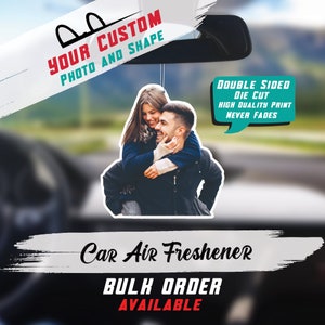 May include: A custom car air freshener with a photo of a couple. The air freshener is double-sided, die-cut, and printed with high quality ink that never fades. Bulk orders are available.