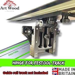 May include: A black hinge designed for a Festool track, with the text "HINGE FOR FESTOOL TRACK" in white on a green background. The image also shows a Festool guide rail and the text "Art Wood LINCOLN". Made in Britain.