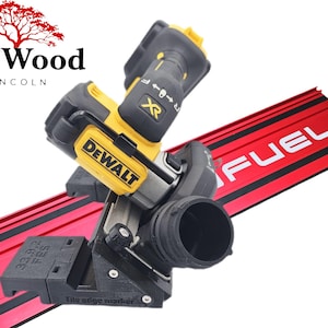 May include: A black and yellow DeWalt power tool is mounted on a red metal guide rail with the word "FUEL" in white. The tool is attached to a black plastic component with the text "Tile edge marker". The Art Wood Lincoln logo is in the upper left.