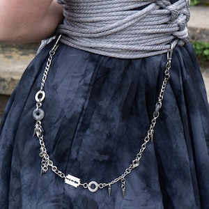 Professional griefers alternative trouser chain with smoke quartz and industrial findings and spike charms, busy punk neck chain with quartz