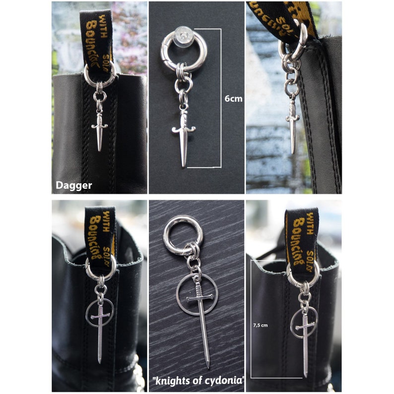 K&ouml;nnte beinhalten: Silberne Stiefelanh&auml;nger mit Dolch- und Schwertanh&auml;ngern. Ein Dolch-Anh&auml;nger ist 6 cm lang. Ein anderer Anh&auml;nger hat ein Schwert in einem Kreis und ist 7,5 cm lang. Die Anh&auml;nger sind an schwarzen Stiefeln befestigt.