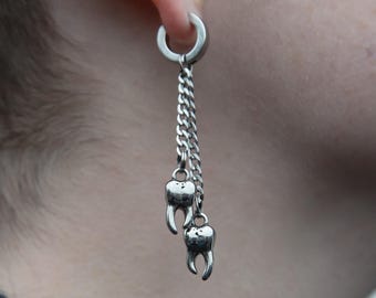 Uppercut - stainless steel dangle chain and tooth charm earrings