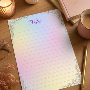 May include: A rectangular sheet of paper with a soft pastel gradient background transitioning from blue to yellow. The paper features the word Notes in purple script at the top, horizontal dotted lines, and delicate floral illustrations in the corners.