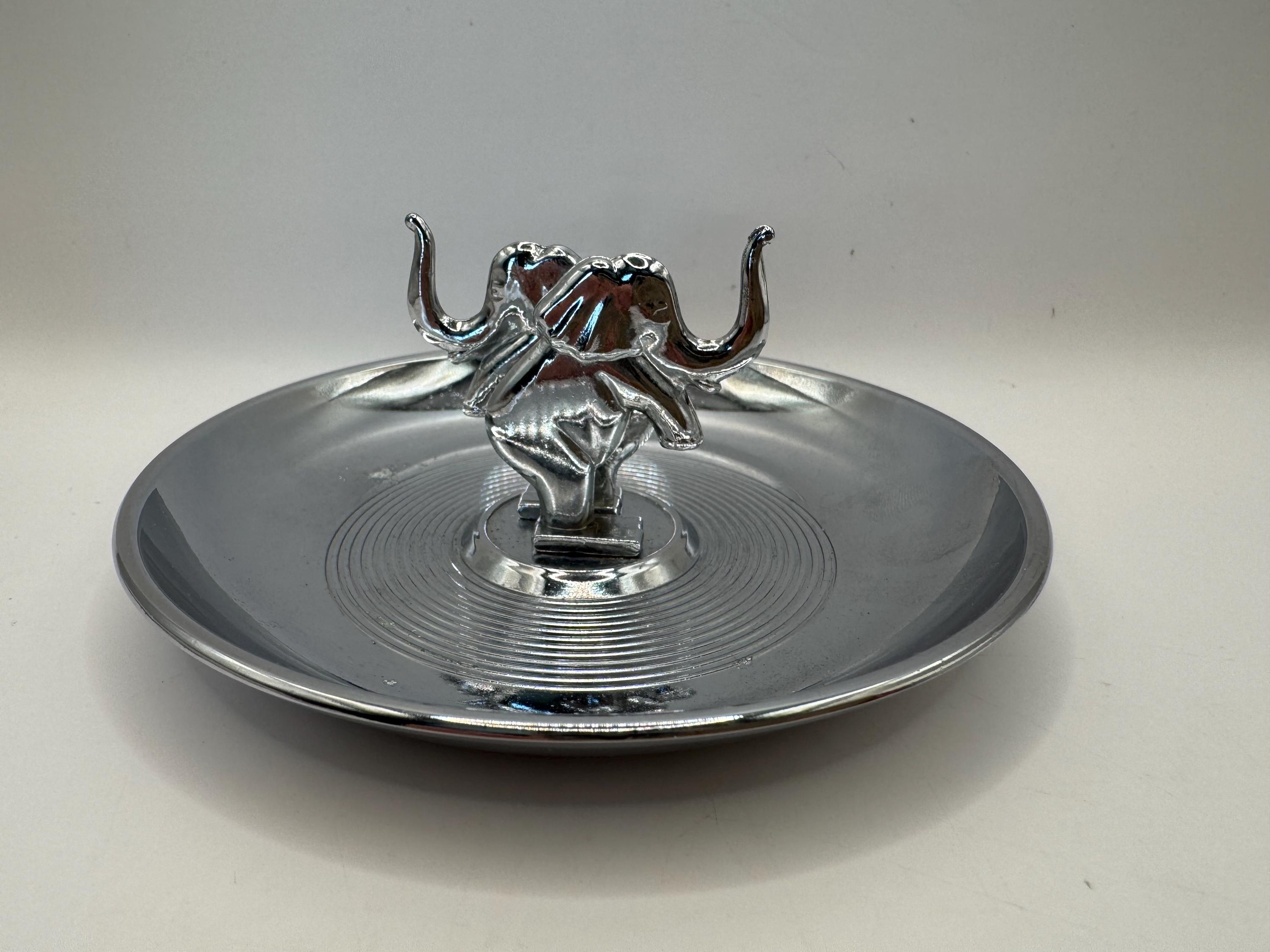 MCM Hamilton Product Chrome Pincherette Elephant and Marlin