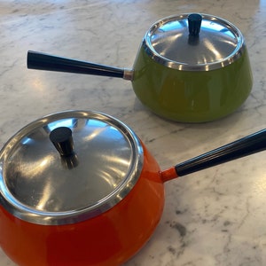 Spring vintage fondue pot. Olive green or bright orange enamel with stainless steel lid.