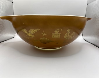 Pyrex Early American brown and gold Cinderella nesting bowls. Single brown Cinderella bowl.