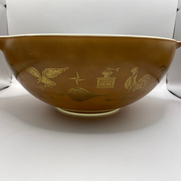 Pyrex Early American brown and gold Cinderella nesting bowls. Single brown Cinderella bowl.