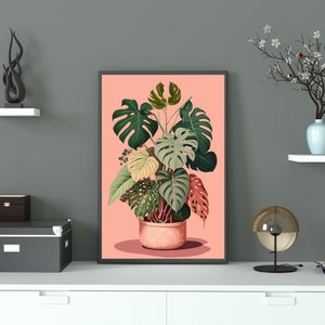 May include: A framed print of a pink background with a potted plant with green, yellow, and red leaves. The plant is in a terracotta pot.