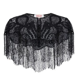 May include: Black beaded lace shawl with fringe trim. The shawl has a scalloped edge and a delicate floral pattern.