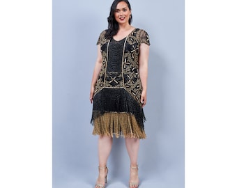 May include: A black and gold flapper dress with fringe detailing. The dress has a V-neckline and short sleeves.