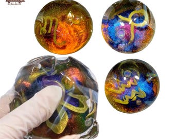 Portachiavi antistress con sfera a forma di Taba glitterata, giocattolo sensoriale morbido e comprimibile per alleviare lo stress.