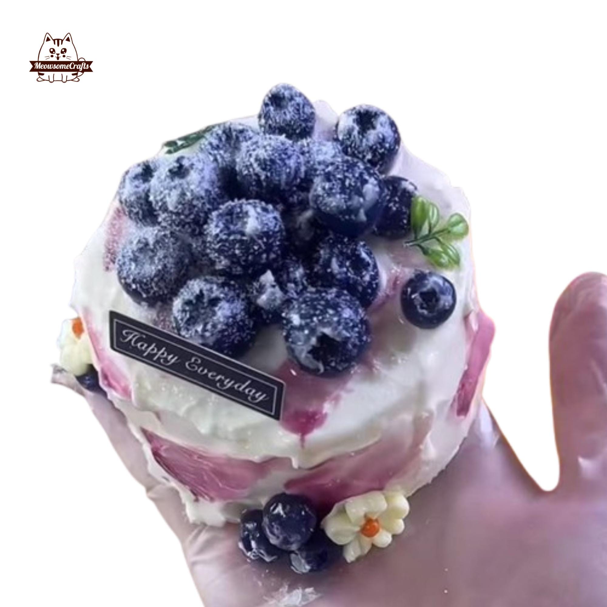 柔らかいブルーベリーケーキの食べ物タバ、スクイーズして握れる