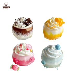 May include: Four glass jars filled with different flavored desserts. The jars are topped with whipped cream and various toppings, including chocolate, sprinkles, and fruit.
